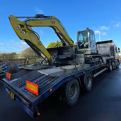 excavator on a truck